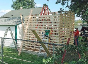 Members of the Eastside Fire Fighters Benevolent Fund built a wood shed for the Carnation senior center thrift shop to provide storage for wood.