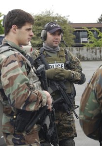 Issaquah Police are conducting a search for a man who allegedly threatened another man with a handgun in downtown Issaquah this morning.