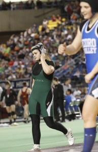 Skyline's Lexi Willcher walks off the Tacoma Dome mat after suffering a late third-round pin Saturday night. She finished second at 145 pounds — her third straight second-place finish at the state meet.