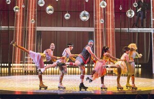 Dane Stokinger and cast show their skills at roller skating.