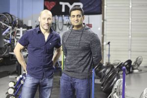 Ben Bigglestone (left) and Navin Singh have worked together to get Singh in shape to compete at Kona.