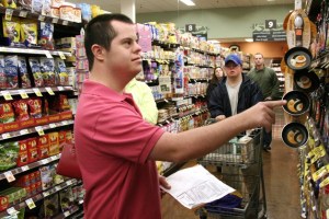 Stephan Daghofer finds the maple syrup at a grocery store in Issaquah. The ACT program
