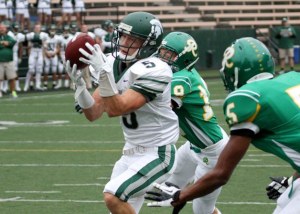 Skyline receiver Trevor Barney hauls in a pass for a touchdown in the win over Roosevelt.