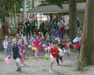 The Heritage Hills neighborhood gathered to watch children through 5th grade race around Heritage Hills Park in the morning on March 27. In the evening