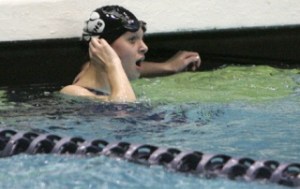 Eastlake freshman Kathryn Kinnear reacts as she sees on the scoreboard that she finished first in the 100 yard butterfly final during the 2008 WIAA 2A/4A Girls Swim & Dive Meet at King County Aquatics Center in Federal Way on Sat.