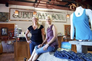 Sales associates Julie Barney and Mary Jacobs at the new Suburban Soul store in the Issaquah Commons.