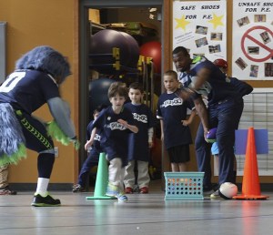 Chandler Fenner throws a pass to a Creekside student as Blitz
