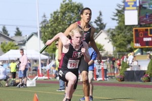 Eastlake's Drew Lewis and Matt Morrison pass the baton during the Wolves' state title winning 1