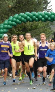 They're off. Runners lead the pack in the 2014 Turkey Trot to benefit the Issaquah Food and Clothing Bank.
