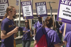 Unionized health care workers picketed outside Swedish Issaquah Wednesday.