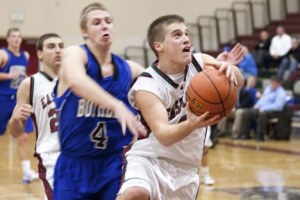 Eastlake junior guard Conner Iraola swoops past Bothell defender Dylan Hanley for two of his career-high 26 points Tuesday night. He hit six three-pointers in the game.