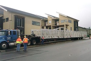 A significant piece of a new pedestrian bridge linking the Highlands Park and Ride and the new YWCA arrived Wednesday. It was scheduled to be installed Thursday morning with a second section