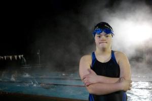 Freshman Megan Mills has contributed to successful bonding of the Eastside Catholic swim team — a group that more than tripled in size from last season.