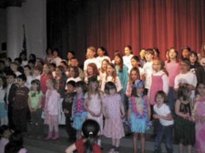 A group of Issaquah Valley Elementary students sings “Hello Children