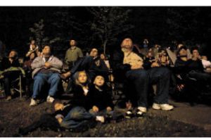 Spectators at the Fourth on the Plateau enjoy the fireworks display last Friday. City officials have said that next year’s show may be set to music.