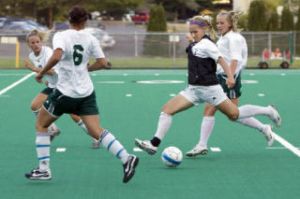 Eastlake’s Emily Hurd winds up for a shot Tuesday night at Pop Keeney Stadium in Bothell. The Wolves out-shot Woodinville 8-5 for the game