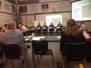 Daniel Nash/Staff PhotoLegislators and staff of the Issaquah School District and city of Issaquah questioned a panel of real estate and public development professionals Monday night to find out more about urbanizing schools.