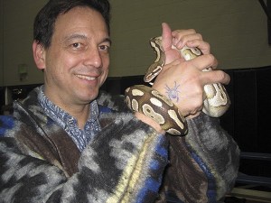 Issaquah High School biology teacher Bryan Robles holds Hamilton