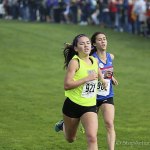 Issaquah junior Kenna Clawson captured ninth place individually at the Class 4A girls Cross Country state meet, clocking a time of 18:32.4. The Eagles girls Cross Country team captured first place overall in the Class 4A division, compiling 90 team points at the state meet on Nov. 5 in Pasco.                                Photo courtesy of Don Borin/Stop Action Photography