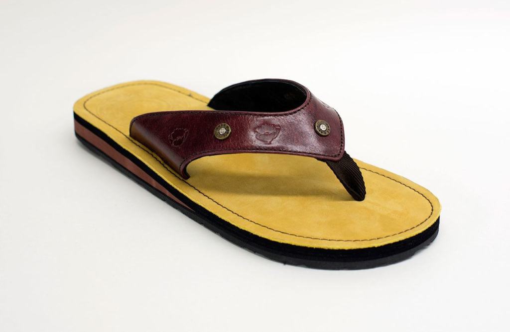 Combat Flip Flops have the sole of a combat boot; Griffin first came up with the idea for the unique style of shoe while touring a factory in Afghanistan. Photo courtesy of Combat Flip Flops