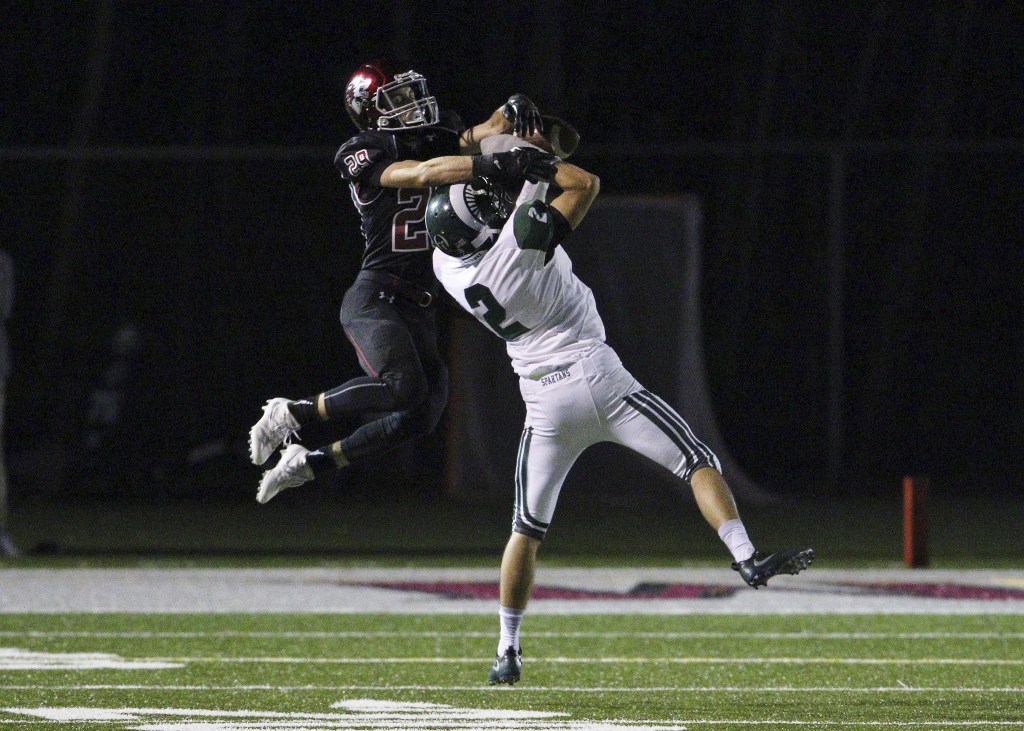Eastlake&rsquo;s Parker Lester, left, and Skyline&rsquo;s Kai Kang, right, battle for possession of the ball in the first round of the Class 4A state playoffs on Nov. 11 at Eastlake High School in Sammamish. Skyline defeated Eastlake 31-14 to advance to the Class 4A quarterfinals                                Photo courtesy of Jim Nicholson