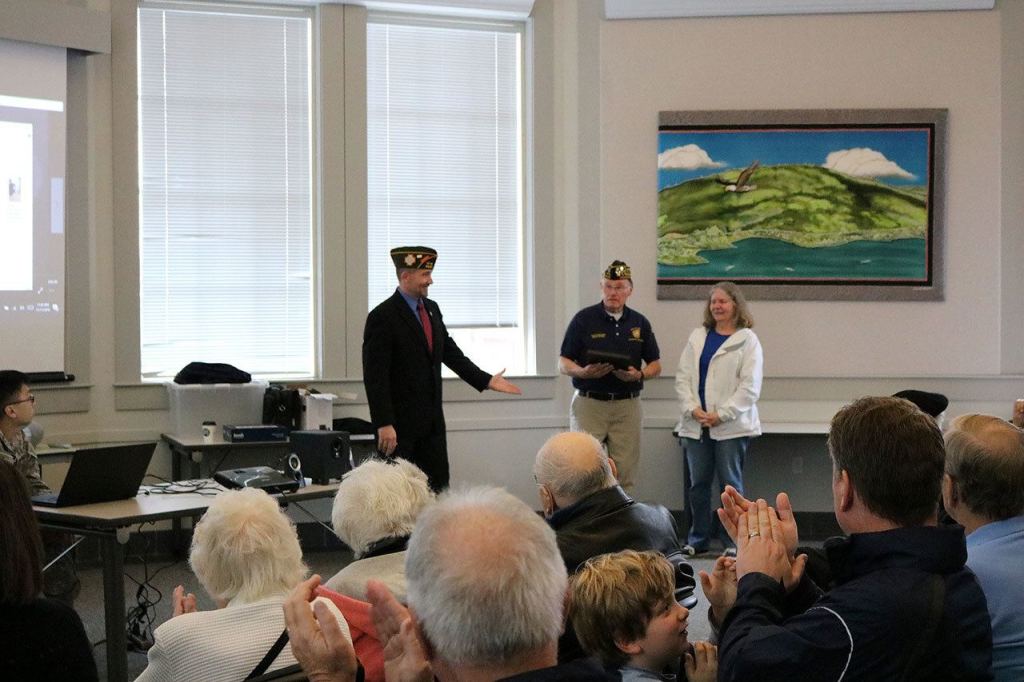 Waggoner (center) is presented with the Lifetime Achievement Award from VFW Post 3436 Commander Dean Van Dyke. Nicole Jennings/staff photo