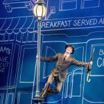 Village recreates the movie&rsquo;s most iconic scene with real rain. Photo courtesy of Village Theatre