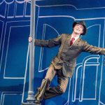 Get out the galoshes! “Singin’ in the Rain” splashes into Village Theatre