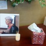 Seniors set up a memorial at the senior center to pay tribute to the late Regina Poirier, who was trespassed from the senior center for nearly the last two years of her life. Nicole Jennings/staff photo