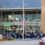 Between 100 and 150 Issaquah High School students staged a walkout Monday afternoon in solidarity with numerous other school districts around the region. Absences caused by the student walkout will not be excused, according to the school. Joe Livarchik/staff photo.