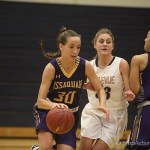 Issaquah Eagles sophomore Megan Sullivan drives to the hoop against the Bellevue Wolverines on Nov. 30. The Wolverines defeated the Eagles 79-59.                                Photo courtesy of Don Borin/Stop Action Photography