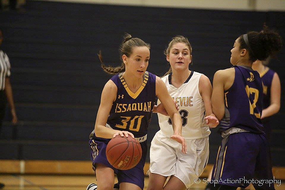 Issaquah Eagles sophomore Megan Sullivan drives to the hoop against the Bellevue Wolverines on Nov. 30. The Wolverines defeated the Eagles 79-59.                                Photo courtesy of Don Borin/Stop Action Photography