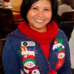 Nicole Jennings/staff photo                                Cecilia Gambill of EZ Lighting shows off a slightly tamer holiday sweater.