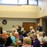 IVS Board President Craig Hansen addresses seniors at the beginning of the very crowded luncheon on Friday. Nicole Jennings/staff photo