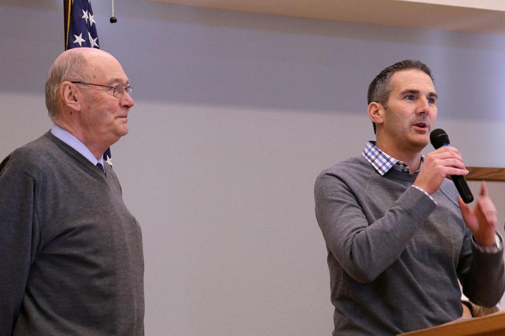 Mayor Fred Butler, left, and Parks and Recreation Director Jeff Watling, right, tells seniors about the city&rsquo;s plans for the new center. Photo courtesy of Ernst Linnemann