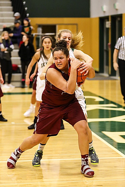 Photo courtesy of Rick Edelman/Rick Edelman Photography                                Eastlake Wolves freshman Keeli Burton scored 22 points against the Skyline Spartans in the Cascade Classic international girls basketball tournament championship game on Dec. 30.