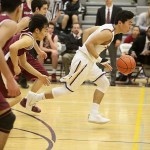 Photo courtesy of Don Borin/Stop Action Photography                                Issaquah Eagles senior guard Jackson Suh, center, leads a fast-break opportunity against the Eastlake Wolves. The Eagles defeated the Wolves 85-76 in overtime on Jan. 6 at Issaquah High School.