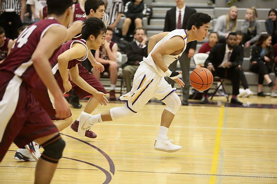 Photo courtesy of Don Borin/Stop Action Photography                                Issaquah Eagles senior guard Jackson Suh, center, leads a fast-break opportunity against the Eastlake Wolves. The Eagles defeated the Wolves 85-76 in overtime on Jan. 6 at Issaquah High School.