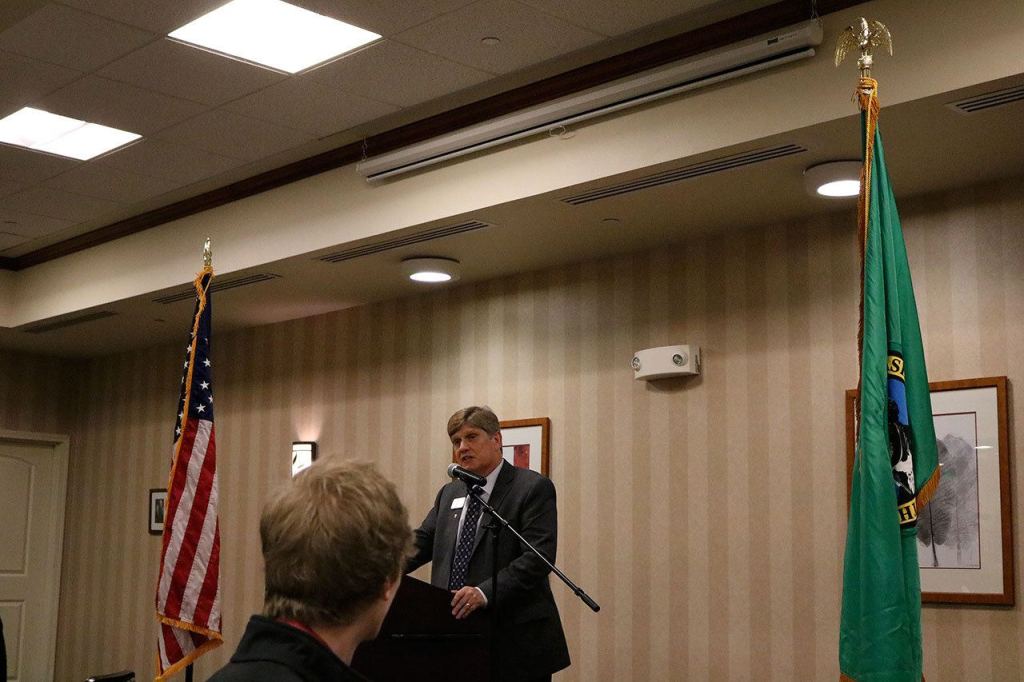 Thiele happily tells the crowd that the school district opened three new schools in the past year. Nicole Jennings/staff photo