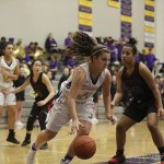 Photo courtesy of Don Borin/Stop Action Photography                                Issaquah forward Mariah VanHalm drives to the basket while being guarded by Newport defender Jahdai Alcombrack in a matchup between KingCo 4A teams on Jan. 13 at Issaquah High School. The Eagles defeated the Knights 48-39.
