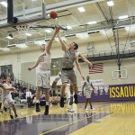 Photo courtesy of Don Borin/Stop Action Photography                                Skyline senior point guard Kellan Przybylski drives to the hoop in a battle between hoops rivals on Jan. 20. Skyline captured a 66-63 win against Issaquah on Jan. 20 in Issaquah.
