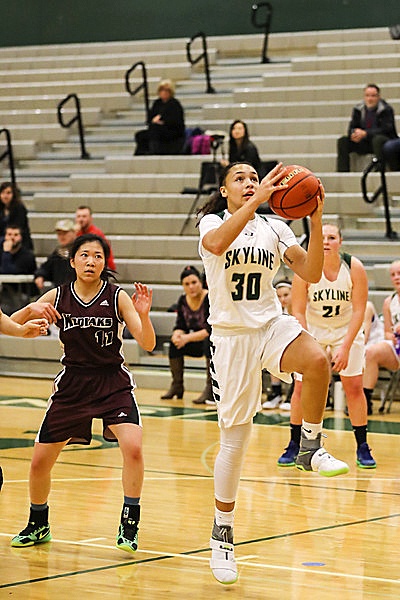 Photo courtesy of Rick Edelman/Rick Edelman Photography                                Skyline Spartans basketball player Jade Loville (photo from December 2016), scored a team-high 25 points for the Skyline Spartans in a 65-57 overtime loss to the Bothell Cougars on Jan. 25 at Skyline High School in Sammamish.