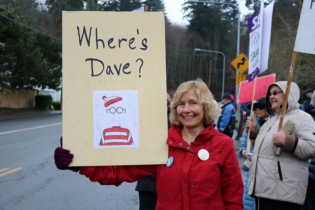 Protesters jokingly compared Rep. Reichert to the title character of the &ldquo;Where&rsquo;s Waldo&rdquo; books, who is known for being good at hiding. Nicole Jennings/staff photo