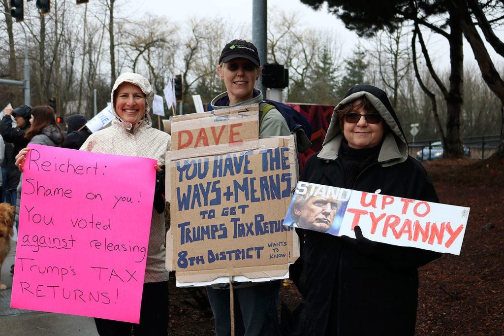 A Puget Sound rainstorm did not stop 150 people from coming out to voice their concerns on Tuesday. Nicole Jennings/staff photo