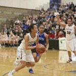 Photo courtesy of Don Borin/Stop Action Photography                                Eastlake Wolves point guard Gina Marxen drives to the hoop against the Curtis Vikings in a regional playoff game on Feb. 24 at Bothell High School. Eastlake defeated Curtis 83-50 to clinch a berth at the Class 4A state tournament.