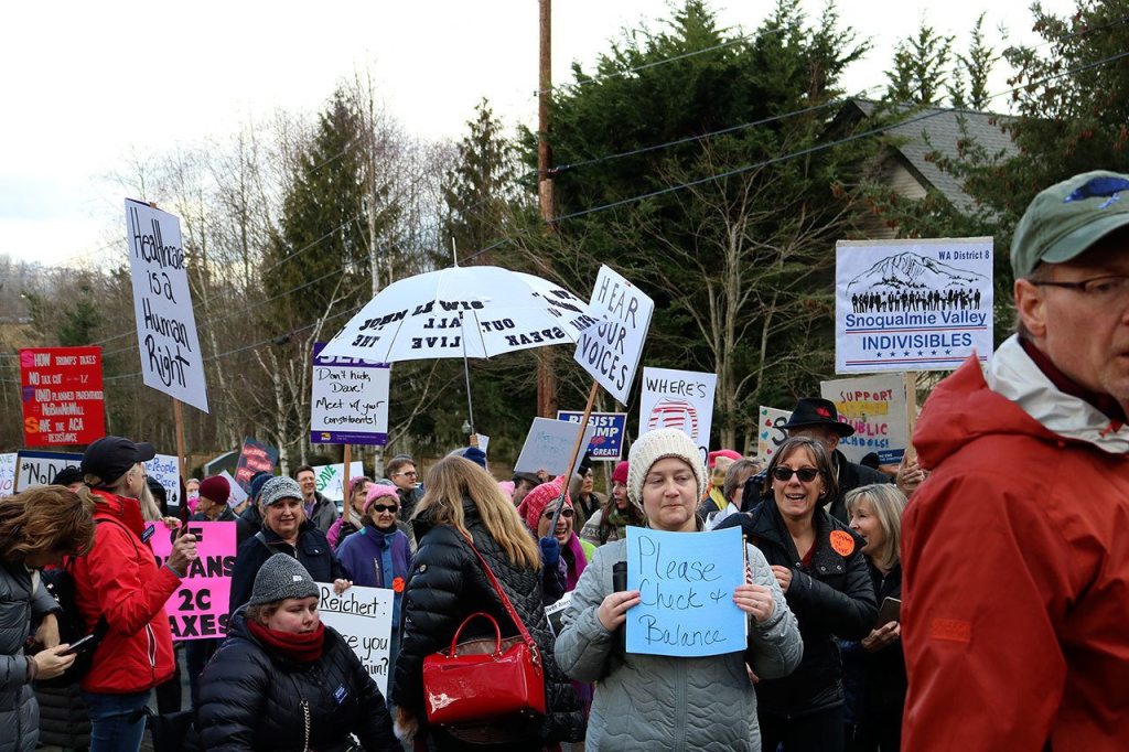 Affordable Care Act, immigration headline concerns of 1,000 anti-Reichert protesters