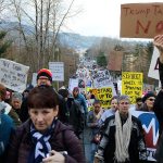 About 1,000 people marched to Congressman Dave Reichert&rsquo;s office on Southeast 56th Street. Nicole Jennings/staff photo