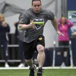 Photo courtesy of Corky Trewin/Seahawks.com                                Sportswriter Shaun Scott sprints in the 40-yard dash at the second annual Seattle Seahawks media combine on Feb. 22 at the Virginia Mason Athletic Center in Renton.