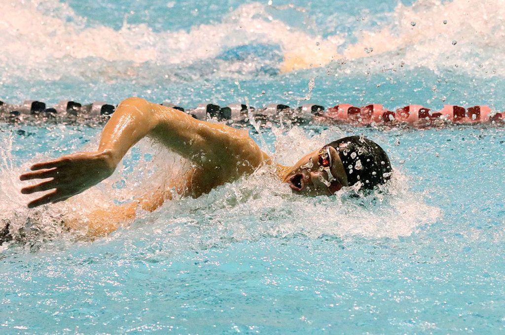 Issaquah&rsquo;s Brandon Leu competes in the 100 free. Leu placed fifth with a time of 47.7 (Joe Livarchik/staff photo).