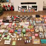 Bbox donation items spread out prior to packaging (photo courtesy of Julie Franke).